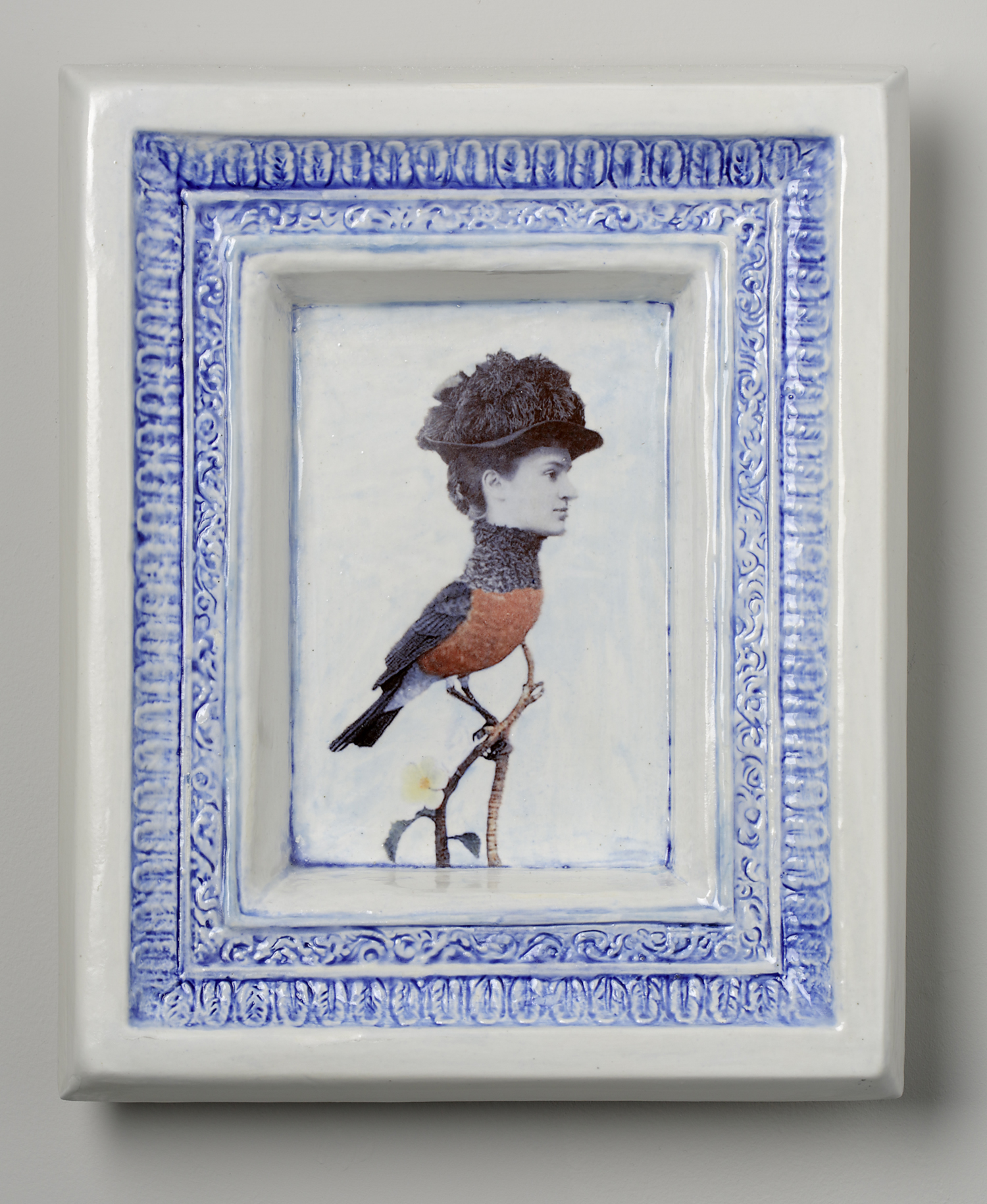 Victorian women's portrait photo on body of bird. Ceramic decal on ceramic frame.